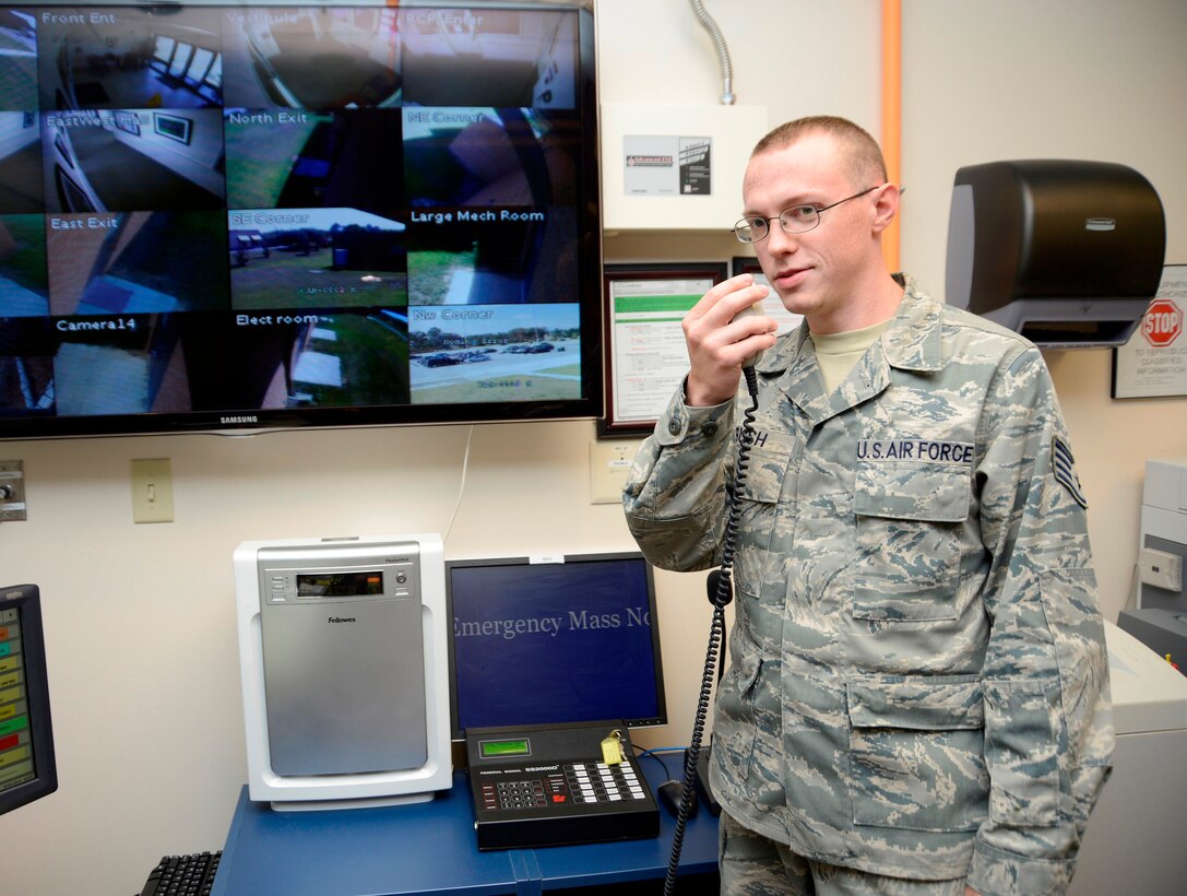 Staff Sgt. Tyler Bush, senior emergency action controller, demonstrates the Giant Voice System. It is a part of the Installation Notification Warning System, which allows
controllers to inform the base populace of emergency situations that require immediate action such as alarm conditions, FPCON/INFOCON changes and natural
disaster warnings. (U. S. Air Force photo by Ed Aspera)