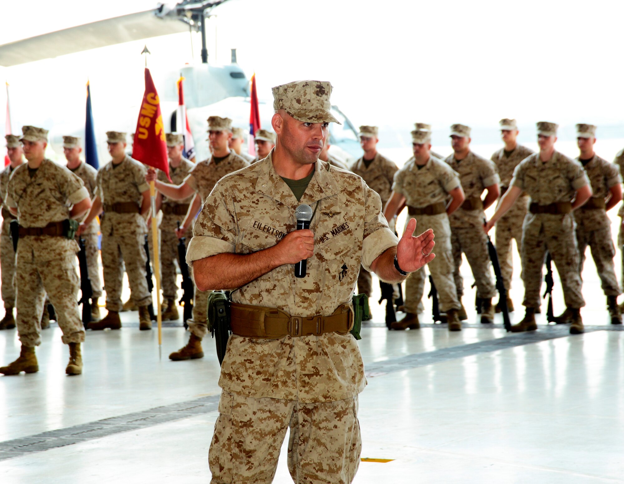 Lt. Col. Philip Eilertson, addresses the audience after assuming command of Marine Aircraft Group 49 Detachment A during a change of command ceremony June 16, 2014. (U.S. Air Force photo by Ed Aspera)