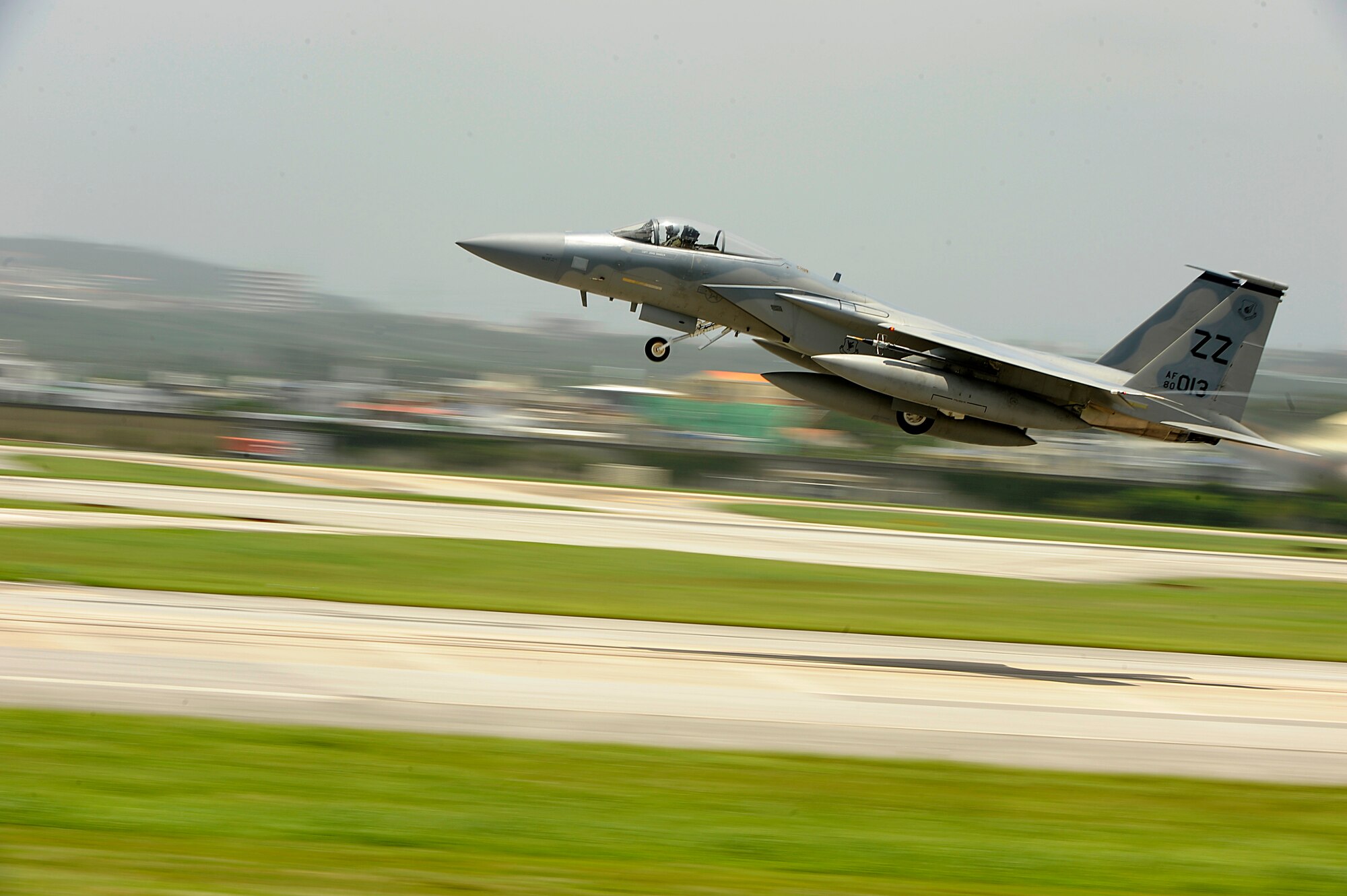 A 44th Fighter Squadron F-15C Eagle takes off from Kadena Air Base, Japan, for aviation training relocation to Andersen Air Force Base, Guam, June 18. The ATR provides service members from Kadena the opportunity to integrate with Pacific Air Forces units in the region and strengthen the U.S. Air Force's ability to respond to a potential threat in the region. The repositioning also relieves the noise impact of Kadena jets on the local community. (U.S. Air Force photo by Senior Airman Maeson L. Elleman)