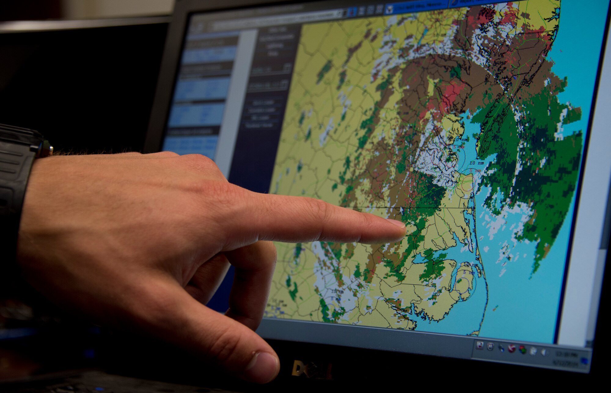 U.S. Air Force Senior Airman Timothy Wigton, 208th Weather Flight, points out East Coast weather conditions while in Little Falls, Minn., June 12, 2014. Wigton is in the last phase of his upgrade skill training during which he was evaluated on his knowledge of weather. 


(U.S. Air National Guard photo by Tech. Sgt. Amy M. Lovgren/Released)