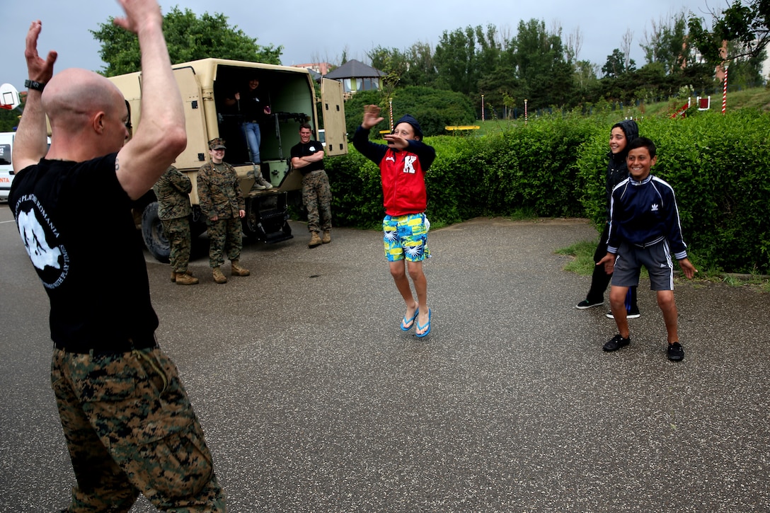 Marines and sailors of BSRF-14 work hard, play hard with kids for ...