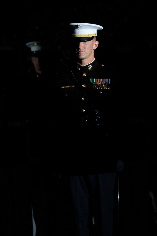 Capt. James Prussing, Company B platoon commander at Marine Barracks Washington, D.C., performs during a Friday Evening Parade at the Barracks, June 23, 2014. (Official Marine Corps photo by Cpl. Dan Hosack/Released)