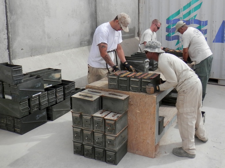 Personnel supporting joint munitions disposal operations in Afghanistan are delinking .50 caliber rounds, or taking them out of their links, and placing them loosely in cans for later burning in the incinerator, the approved method for disposal.    