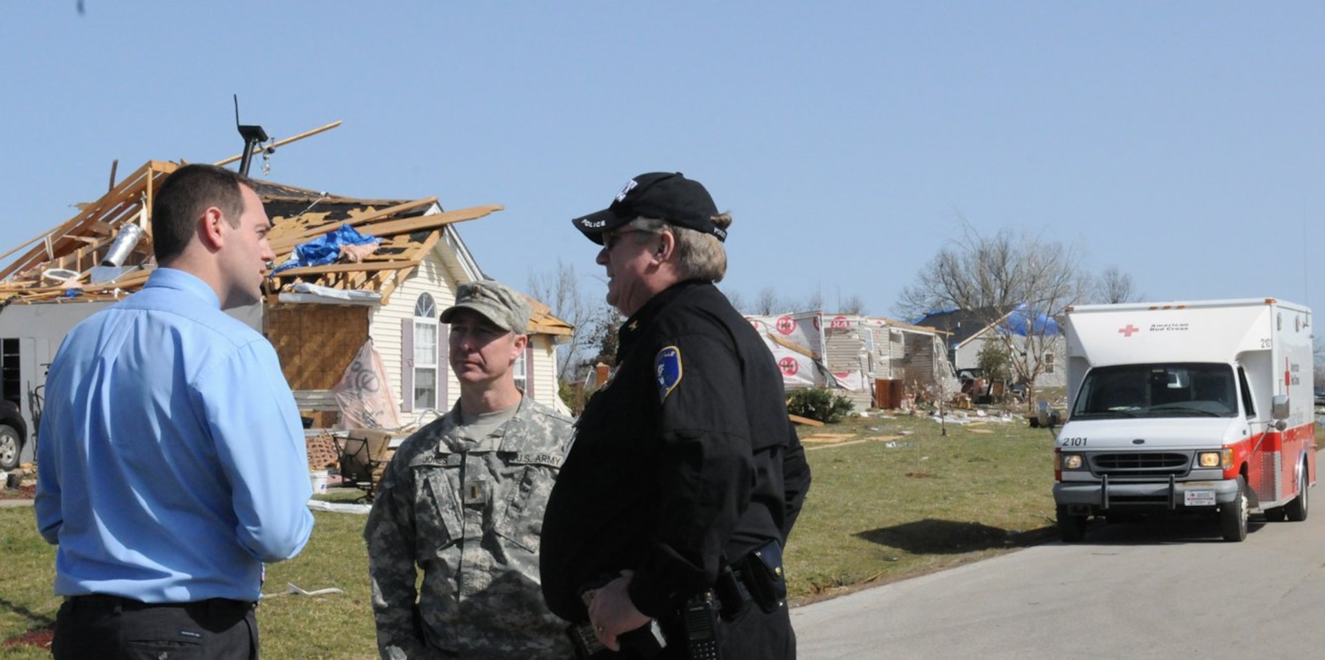 Army 2nd Lieutenant Sean Jones meets with local authorities in LaRue County, Ky., March 1, 2012, to coordinate the Kentucky National Guard mission following the tornado that struck the community of Hodgenville on Feb. 29, 2012.