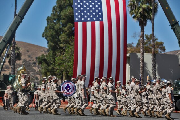The 1st Marine Division Band performs during a change of command ceremony hosted by 1st Medical Battalion, 1st Marine Logistics Group aboard Camp Pendleton, Calif., June 17, 2014. Navy Capt. James A. LeTexier, commanding officer, 1st Med. Bn., passed on command of the battalion to Navy Capt. Theodore P. Briski, who recently served as the executive officer of Naval Hospital Lemoore, Calif.