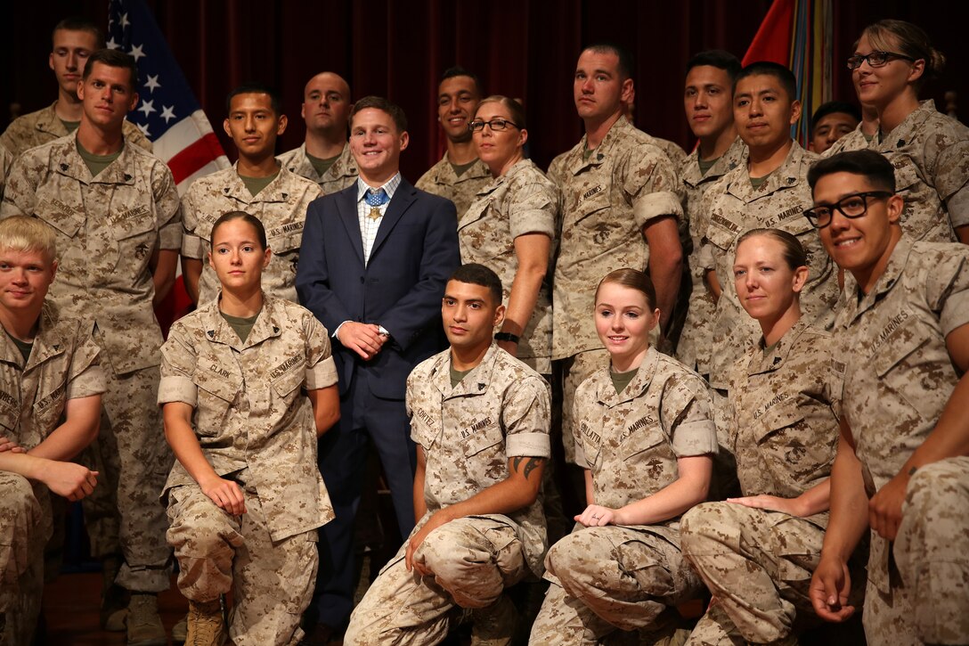 Medal of Honor recipient Cpl. William “Kyle” Carpenter visited Marines on Camp Pendleton, June 23. Carpenter met and talked with Marines at the base theater, answering their questions and sharing his personal experience. Carpenter then met and took photos with units from across Camp Pendleton. 

Carpenter received the Medal of Honor during a ceremony at the White House on June 19, 2014 for his courageous actions while serving as an automatic rifleman in Helmand province, Afghanistan on Nov. 21, 2010. 

For more information about Cpl. Kyle Carpenter please visit http://www.marines.mil/moh/medalofhonor.aspx
