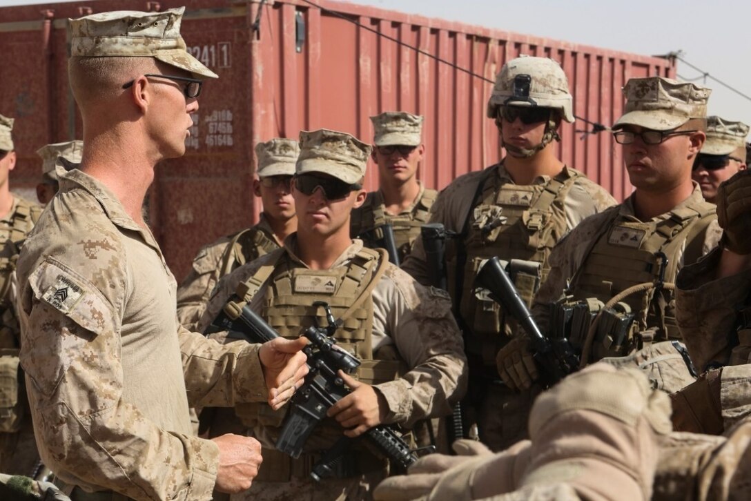 Sergeant James Hall, a section leader with 1st Battalion, 2nd Marine Regiment, goes over range rules and a safety brief prior to starting a combat marksmanship range held aboard Camp Leatherneck, Helmand province, Afghanistan, June 20, 2014.  Ranges such as this one keep Marines like Hall, a South Webster, Ohio native, on top of their shooting skills and give them the confidence they need while on a patrol. (U.S. Marine Corps photo by Cpl. Michael Dye/released)