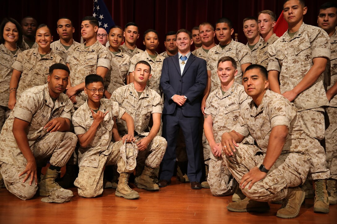 Medal of Honor recipient Cpl. William “Kyle” Carpenter visited Marines on Camp Pendleton, June 23. Carpenter met and talked with Marines at the base theater, answering their questions and sharing his personal experience. Carpenter then met and took photos with units from across Camp Pendleton. 

Carpenter received the Medal of Honor during a ceremony at the White House on June 19, 2014 for his courageous actions while serving as an automatic rifleman in Helmand province, Afghanistan on Nov. 21, 2010. 

For more information about Cpl. Kyle Carpenter please visit http://www.marines.mil/moh/medalofhonor.aspx