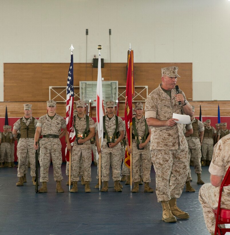 Lt. Gen. John Wissler, right, gives remarks during the post, relief and retirement of Sgt. Maj. Steven D. Morefield June 17 at Camp Hansen. Morefield served in the Marine Corps for 32 years, three of which were spent as the III Marine Expeditionary Force sergeant major. Wissler is the commanding general of III MEF.