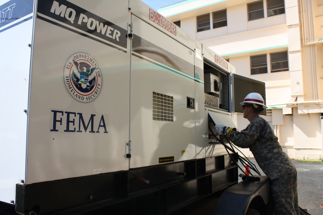 A Soldier from Alpha Company, 249th Engineer Battalion (Prime Power),Schofield Barracks prepares a Federal Emergency Management Agency generator for a live install at Fort Shafter, Hawaii. Exercise Makani Pahili, which is the state of Hawaii's annual hurricane preparedness exercise, was conducted June 3-4.