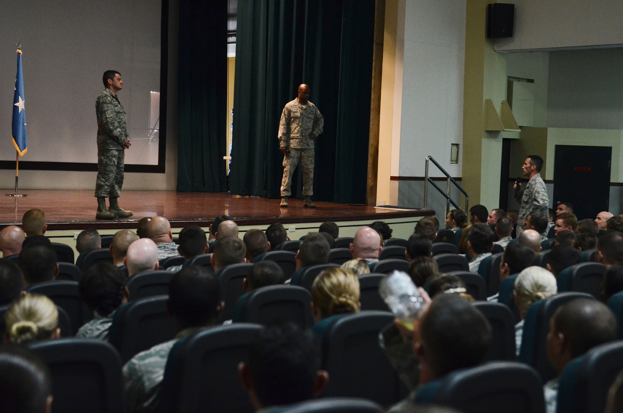 (Right) Lt. Col. Steve Harrold, 36th Operations Group deputy commander, asks Lt. Gen. Russell Handy, 11th Air Force commander, a question during an all call June 19, 2014, on Andersen Air Force Base, Guam. Handy took the opportunity to address Andersen’s Airmen following the 36th Wing change of command. (U.S. Air Force photo by Airman 1st Class Emily A. Bradley/Released)