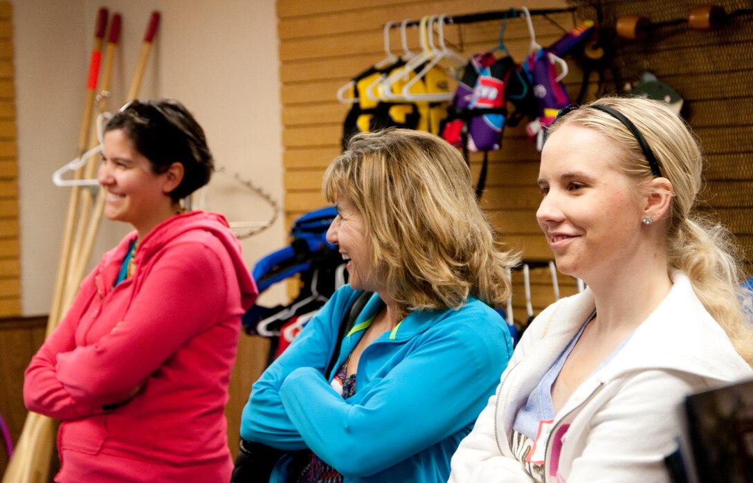 Military spouses, new to the F.E. Warren Air Force Base, Wyo., community, receive a briefing at Outdoor Recreation during the Military Spouse Orientation Tour June 19, 2014. The Airmen & Family Readiness Center hosts quarterly Military Spouse Orientation Tours for recently arrived spouses of Airmen on base. The tour visits the commissary, Base Exchange, Health & Wellness Center, Freedom Hall Fitness Center, medical treatment facility, youth center, skills center, Fall Hall Community Center, Outdoor Recreation, and Chapel. For more information or to sign up for one of these tours, call 773-5946 or 773-2241. (U.S. Air Force Photo by Airman 1st Class Jason Wiese)