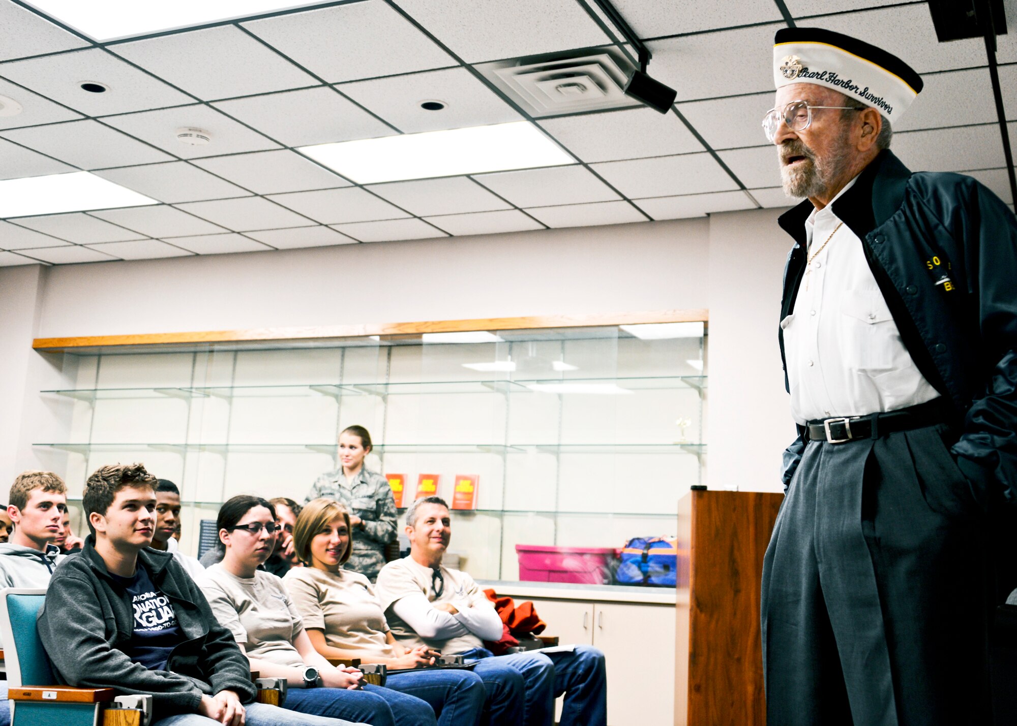 Former lieutenant commander and Pearl Harbor veteran, Edward Vezey Jr. addresses student flight at Will Rogers ANGB Nov. 3, 2013. He spoke to the flight about his experiences at Pearl Harbor aboard the USS Oklahoma and the lessons he took away.
