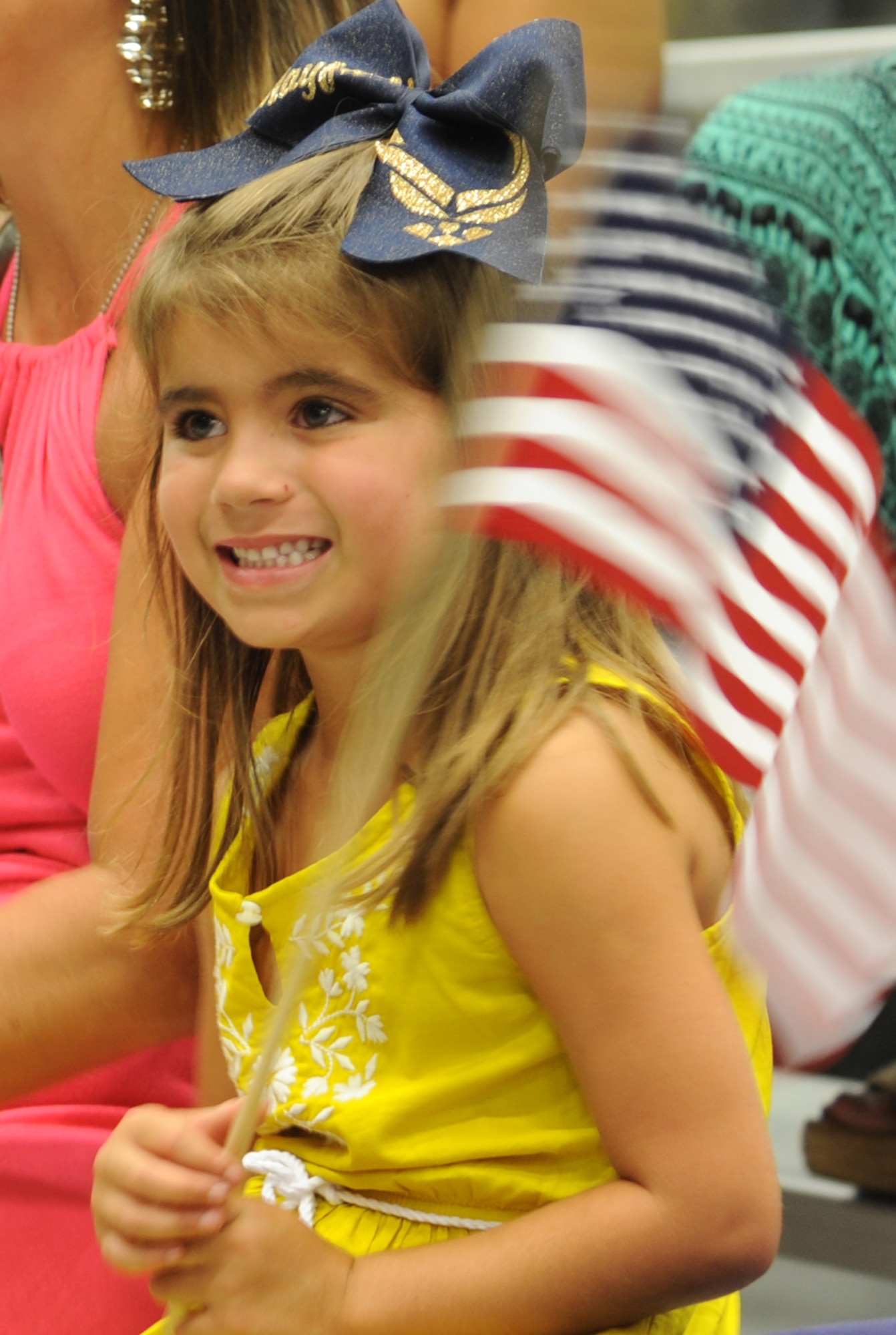 Jasmine Mayfield, 6, waits for her dad, Staff Sgt. Jason Mayfield, 1st Special Operations Equipment Maintenance Squadron maintainer, during Operation Homecoming at Hurlburt Field, Fla., June 21, 2014. Sixty Hurlburt members returned from an overseas deployment. (U.S. Air Force photo/Staff Sgt. Melanie Holochwost)