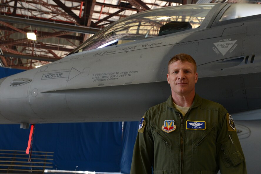 U.S. Air Force Col. James McCune, 495th Fighter Group commander, stands in front of his jet after the 495th FG change of command ceremony at Shaw Air Force Base, S.C., June 20, 2014. McCune took command of the group during the groups 1st change of command since reactivation in 2013. (U.S. Air Force photo by Airman 1st class Jensen Stidham/Released)