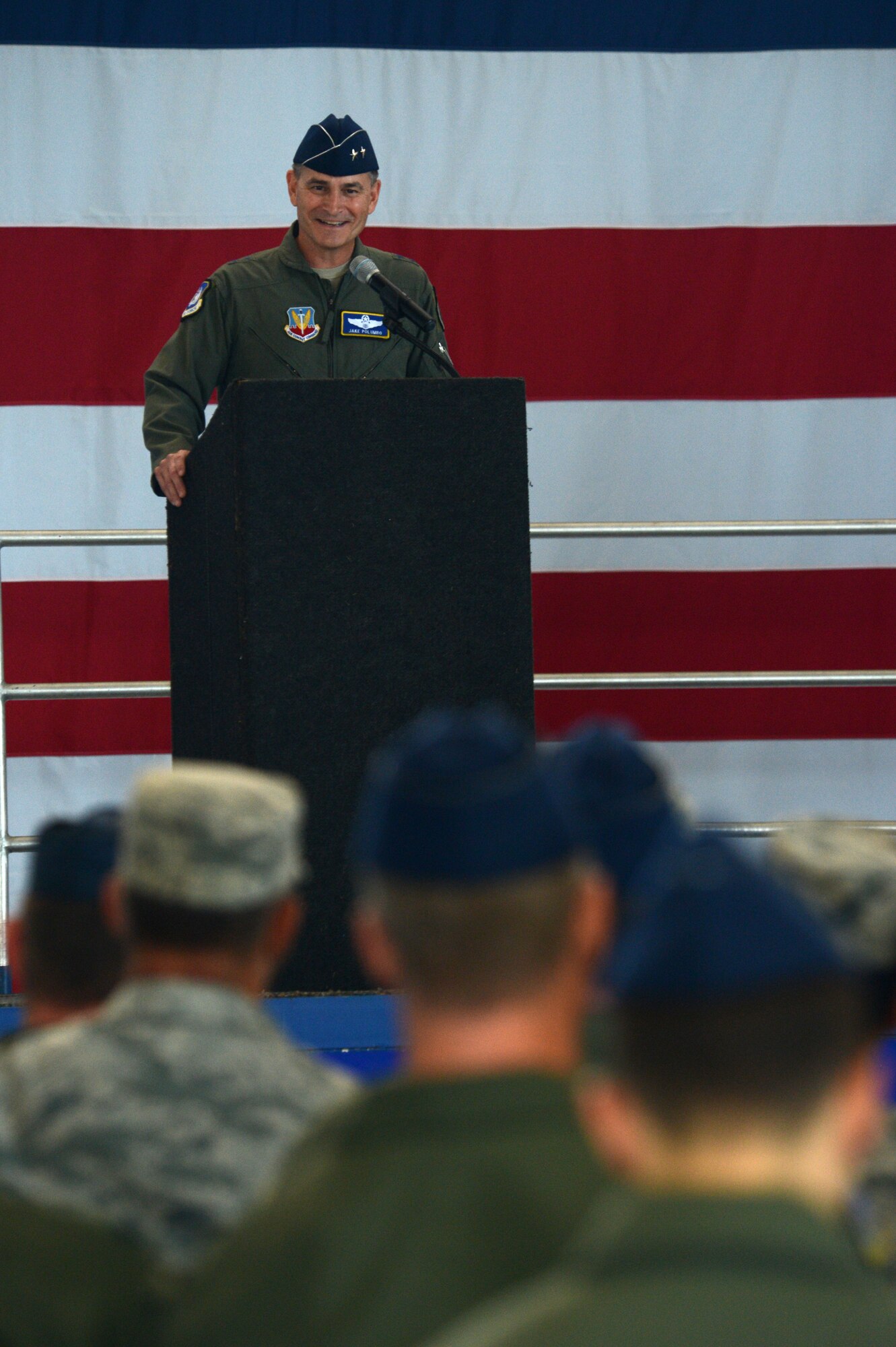 U.S. Air Force Maj. Gen. Jake Polumbo, Ninth Air Force commander, speaks during the 495th Fighter Group change of command at Shaw Air Force Base, S.C., June 20, 2014. Polumbo, the presiding officer, spoke to the attendees about the 495th FG’s rich heritage and how it has impacted the United States. (U.S. Air Force photo by Airman 1st class Jensen Stidham/Released)