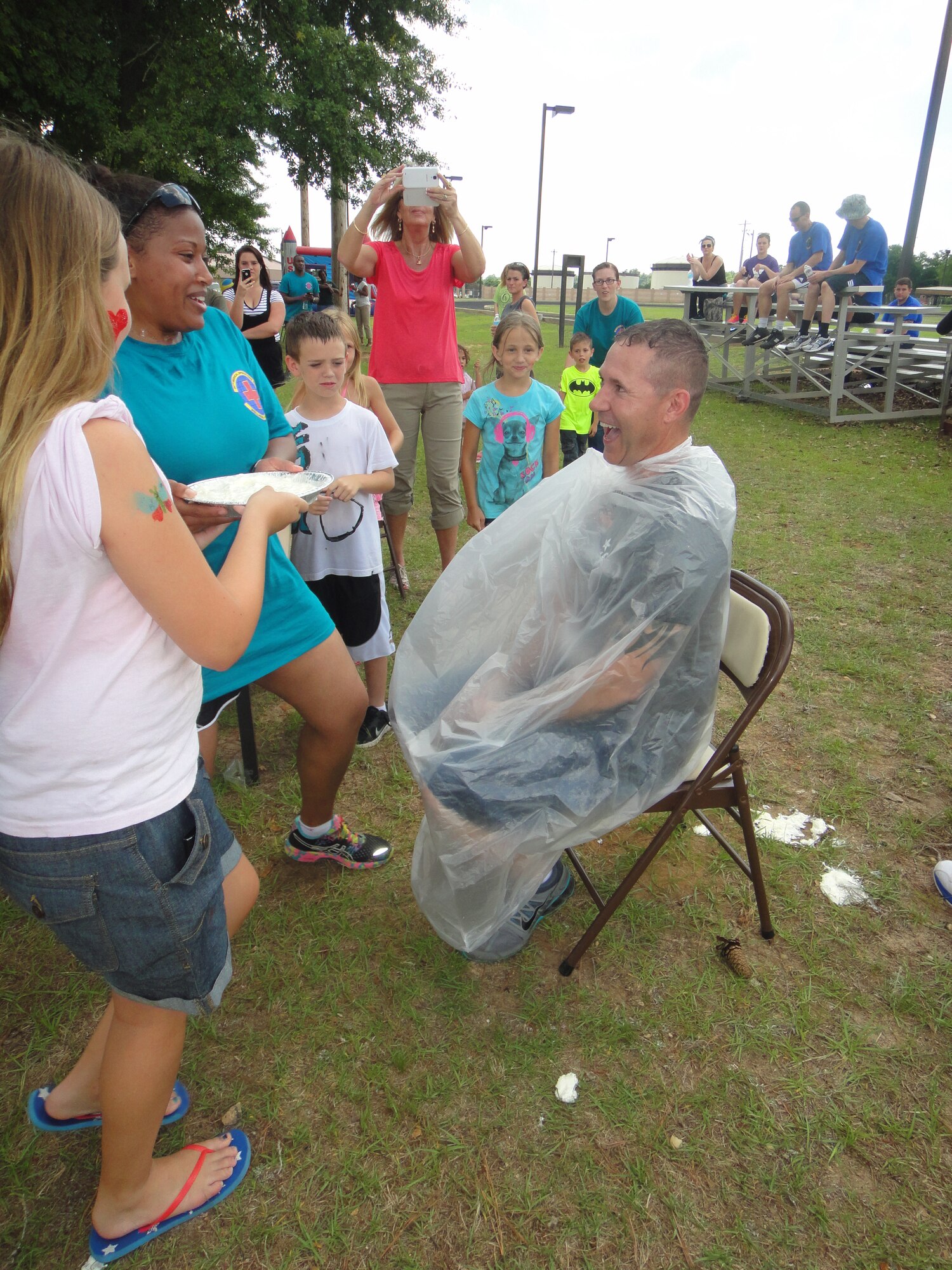 U.S Air Force Chief Master Sgt. Michael Restivo, 20th Medical Group superintendent, prepares for a pie to be smashed in his face for a medical group booster club fundraiser during the group's annual picnic and sports day at Shaw Air Force Base, S.C., June 6, 2014. (Courtesy Photo)