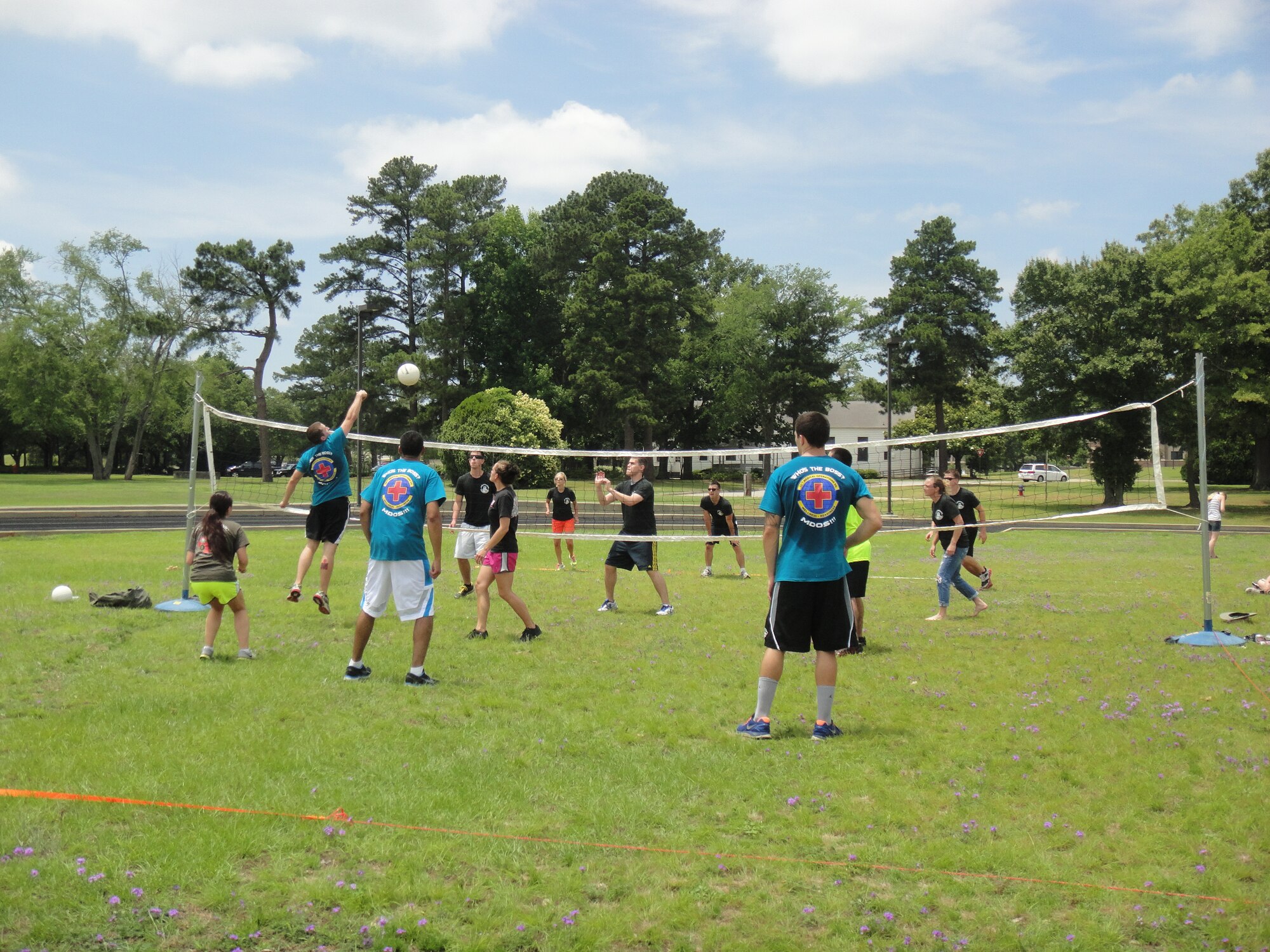 Members of the 20th Medical Group participate in a game of volleyball during a 20th MDG annual picnic and sports day at Shaw Air Force Base, S.C., June 6, 2014. (Courtesy Photo)