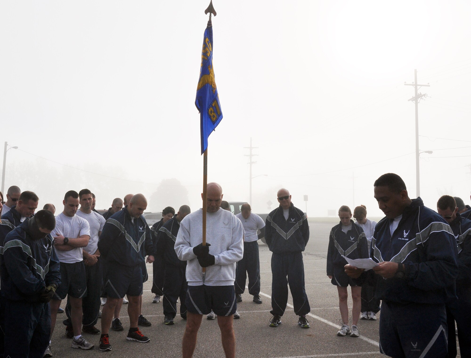WRIGHT-PATTERSON AIR FORCE BASE, Ohio – Chief Master Sgt. James Felton, 445th Airlift Wing command chief, reads the names of the fallen transportation Airmen at the start of a 5K run to pay tribute to them May 18. The Airmen lost their lives while serving in the Air Force Specialty Code 2T2 Transportation Airmen. (U.S. Air Force phot0/Lt. Col. Denise Kerr)