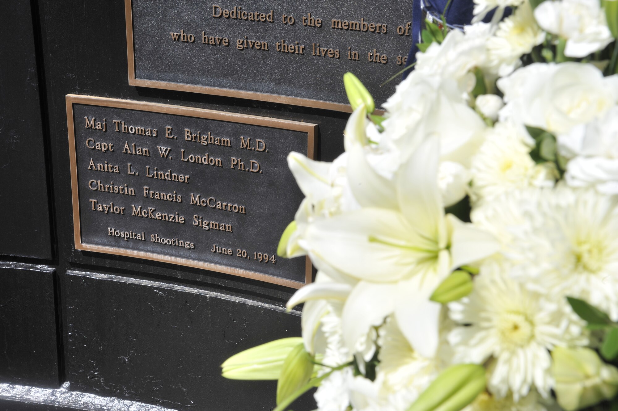 A memorial ceremony was held in remembrance of the fatal hospital shooting 20 years ago that took five lives and injured 22 others at Fairchild Air Force Base, Wash., June 20, 2014. Guest speaker, retired Staff Sgt. Andrew Brown, the man responsible for killing the shooter and ending the massacre, spoke about his struggles dealing with the tragedy and how he is continuously working to overcome the negative imprint left on his life from that day. (U.S. Air Force photo by Senior Airman Mary O'Dell/Released)