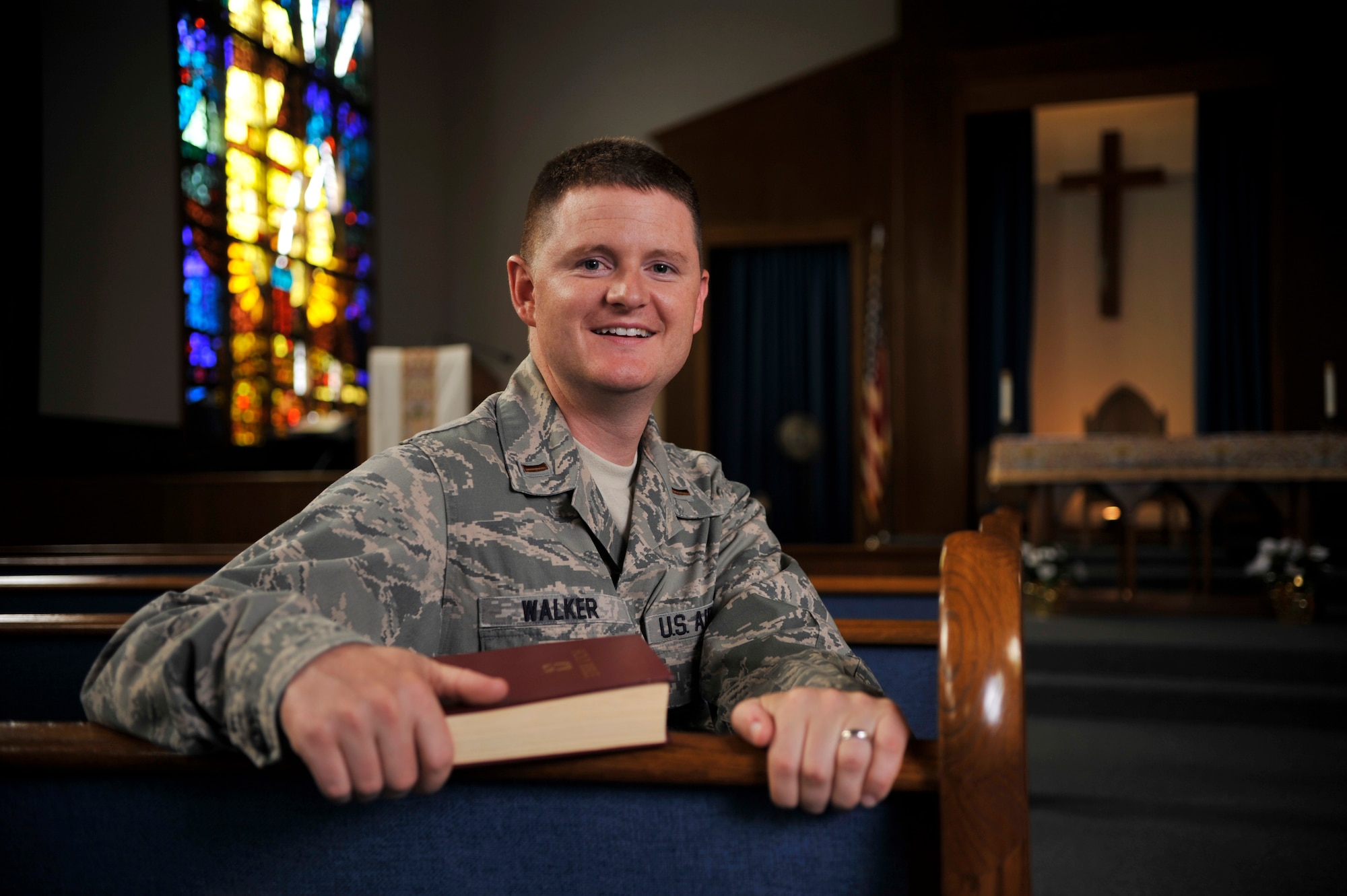 Second Lt. Paul Walker, 47th Flying Training Wing chaplain candidate, poses for a photo in the base chapel at Laughlin Air Force Base, Texas, June 18, 2014. Walker is in the Air Force’s Chaplain Candidate Program and arrived on Laughlin May 19, 2014 to receive hands on training from chapel staff as one of his active duty internships required for candidates to complete during the summer session of their religious education. (U.S. Air Force photo by Senior Airman Nathan Maysonet)(Released)