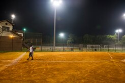 Staff Sgt. David Johnson, 628th Force Support Squadron sports program director, waters an infield, June 18, 2014, at Joint Base Charleston, S.C. The fields are watered to soften them up to give players more traction and prevent injury. (U.S. Air Force photo/Senior Airman George Goslin)