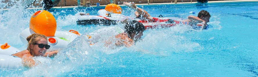 Lifeguards participate in a race June 14 as one of the Beat the Heat events. (U.S. Air Force photo/Airman 1st Class Cory Gossett)