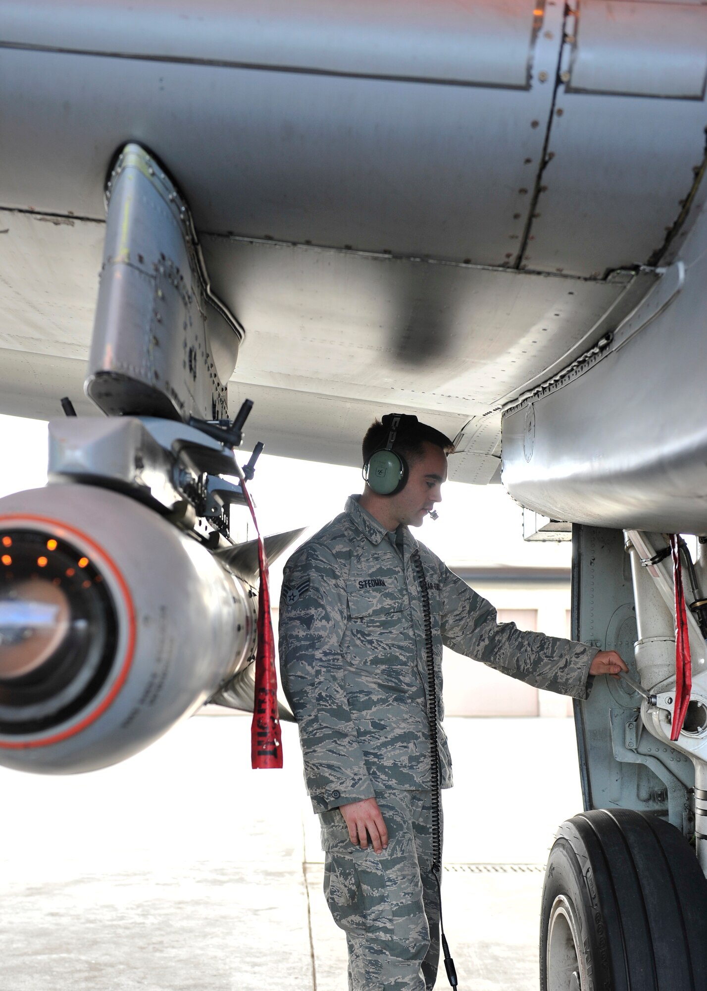 U.S. Air Force Senior Airman Michael Stedman, 51st Aircraft Maintenance Squadron crew chief assigned to Osan Air Base, South Korea, inspects an A-10 Thunderbolt II during RED Flag-Alaska 14-2 June 20, 2014, Eielson Air Force Base, Alaska. As a crew chief, Stedman ensured the aircraft was safe for flight. (U.S. Air Force photo by Senior Airman Ashley Nicole Taylor/Released)