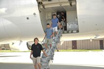 Vanderbilt University baseball team players exit the E-4B after a tour led by U.S. Air Force Maj. Brian Burger, 1st Airborne Command and Control Squadron pilot, and members of the air crew June 15 at Offutt Air Force Base, Nebraska. The team and several of the coaches visited the base as part of a College World Series partnership with the 55th Wing. Every year, the 55th Wing sponsors one team in the College World Series, inviting them to base to learn more about the missions of the 55th Wing and the U.S. Air Force. (U.S. Air Force photo by 2nd Lt. Carly Costello)