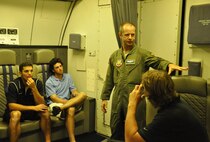 U.S. Air Force Tech. Sgt. Heath Nelson, speaks to a group of Vanderbilt baseball players and their coaches during a tour of the E-4B June 15 at Offutt Air Force Base, Nebraska. Every year, the 55th Wing sponsors a College World Series team, inviting the team to base for a tour and a team dinner with members of Team Offutt. (U.S. Air Force photo by 2nd Lt. Carly Costello)
