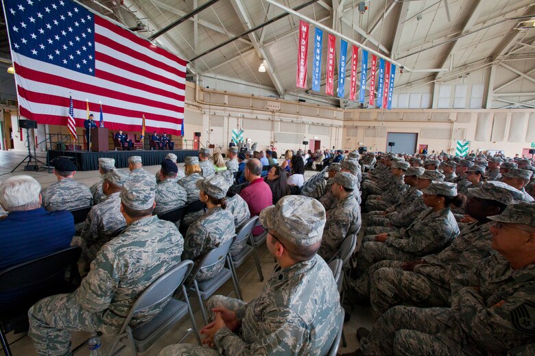 Col. Robert A. Meyer Jr., commander, 108th Wing, addresses the New Jersey Air National Guard leadership, family, friends and 108th Wing Members during a change of command ceremony at Joint Base McGuire-Dix-Lakehurst, N.J., June 22, 2014. A change of command ceremony is a military tradition that represents the formal transfer of authority and responsibility for a unit from one commanding or flag officer to another. Since Sept. 11, 2001, the 108th Wing has deployed Airmen around the globe in support of Operation's Iraqi Freedom, Noble Eagle, Enduring Freedom and New Dawn. (U.S. Air National Guard photo by Master Sgt. Mark C. Olsen/Released)