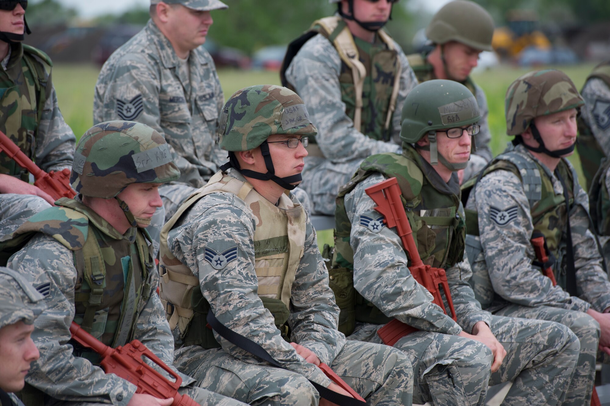 The 5th Civil Engineer Squadron conducted deployment training at Minot Air Force Base, N.D., June 18, 2014. Airmen from all ranks participated in training that taught them how to build a tent together, conduct a proper convoy and how to use some of the large mobile equipment used in a deployed environment. (U.S. Air Force photo/Senior Airman Andrew Crawford)