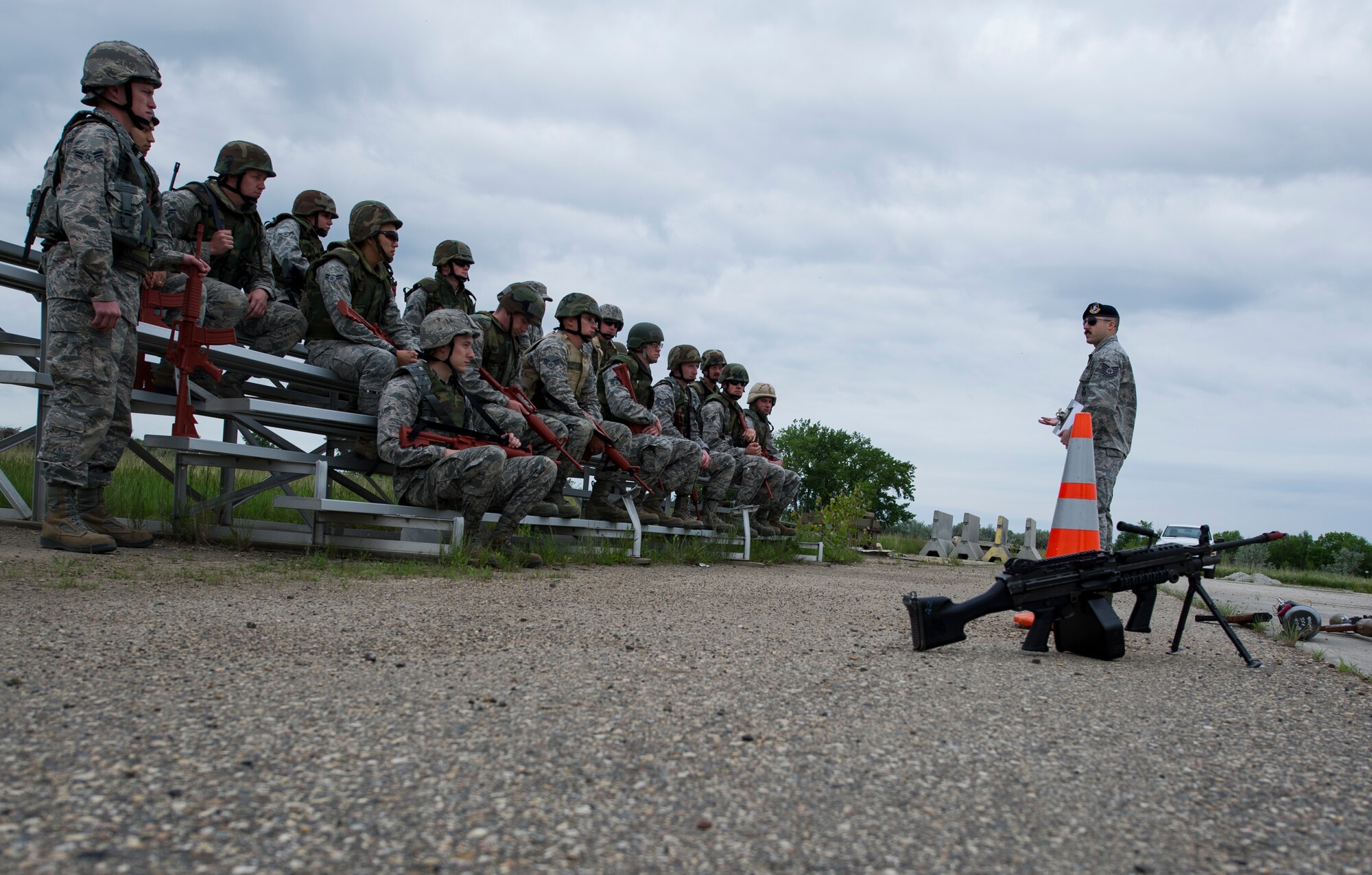 The 5th Civil Engineer Squadron conducted deployment training at Minot Air Force Base, N.D., June 18, 2014. Airmen from all ranks participated in training that taught them how to build a tent together, conduct a proper convoy and how to use some of the large mobile equipment used in a deployed environment. (U.S. Air Force photo/Senior Airman Andrew Crawford)