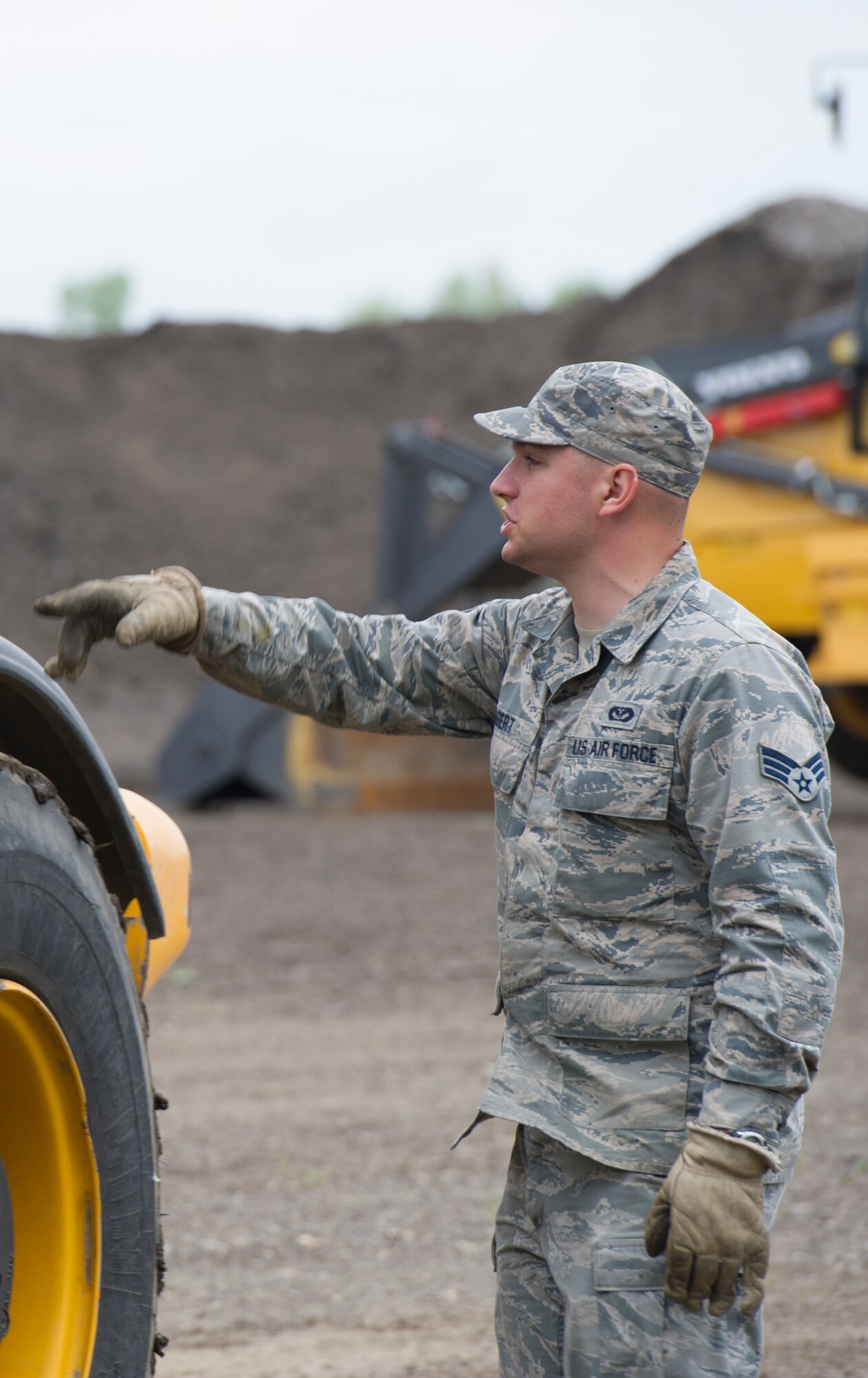The 5th Civil Engineer Squadron conducted deployment training at Minot Air Force Base, N.D., June 18, 2014. Airmen from all ranks participated in training that taught them how to build a tent together, conduct a proper convoy and how to use some of the large mobile equipment used in a deployed environment. (U.S. Air Force photo/Senior Airman Andrew Crawford)