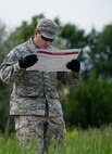 The 5th Civil Engineer Squadron conducted deployment training at Minot Air Force Base, N.D., June 18, 2014. Airmen from all ranks participated in training that taught them how to build a tent together, conduct a proper convoy and how to use some of the large mobile equipment used in a deployed environment. (U.S. Air Force photo/Senior Airman Andrew Crawford)