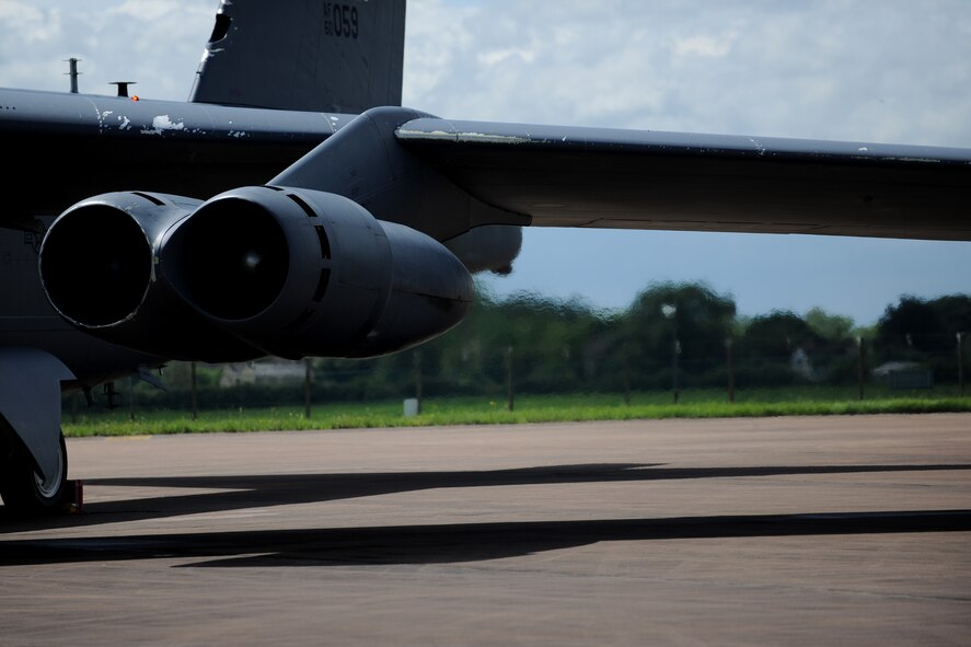 Exhaust streams from the twin jet engines of a B-52 Stratofortress deployed to RAF Fairford, United Kingdom, June 7, 2014. The deployment brought Airmen and aircraft into a training environment that sharpened their skills and tested operational capabilities. (U.S. Air Force photo by Staff Sgt. Jarad A. Denton/Released)