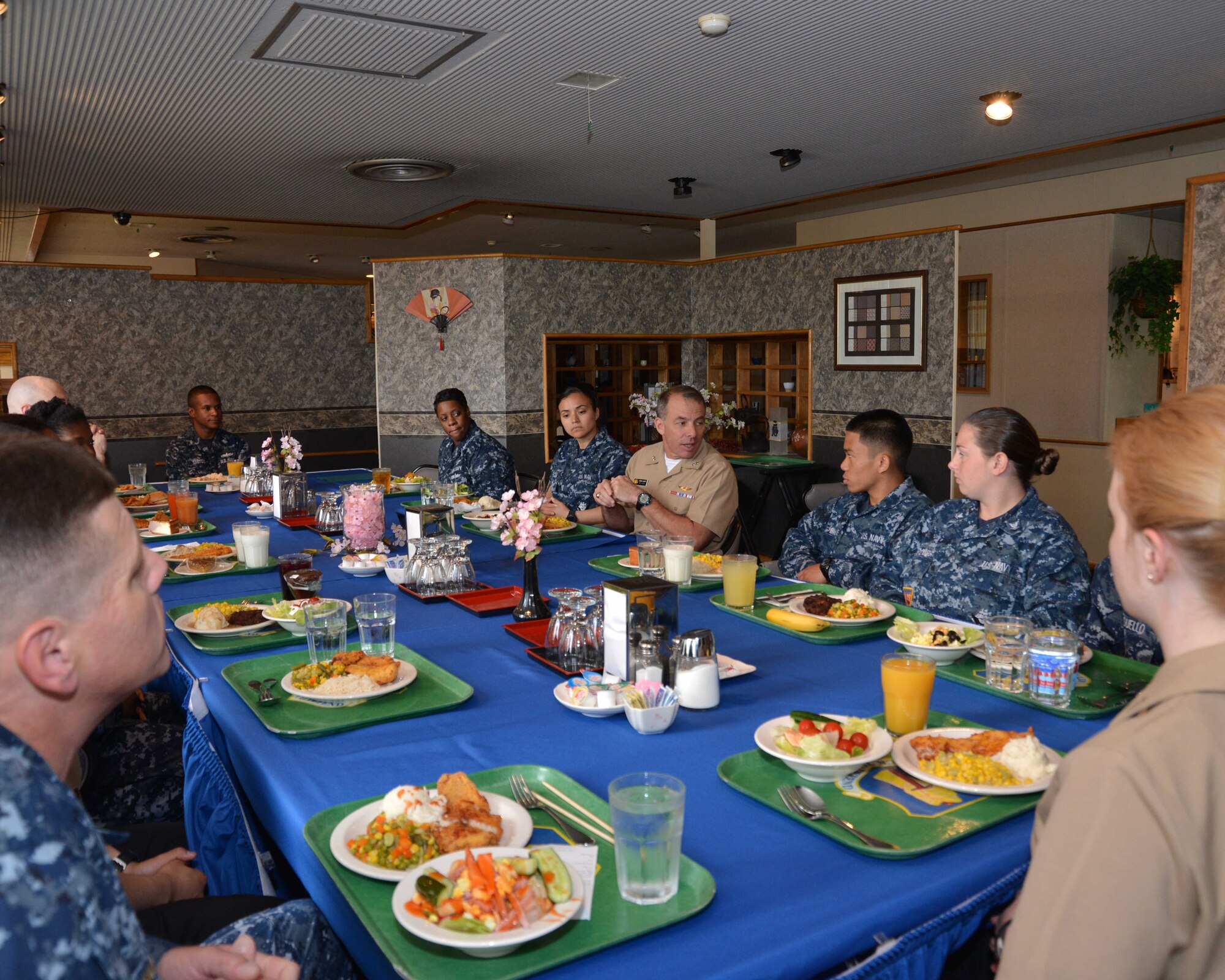 Rear Adm. Terry Kraft, U.S. Naval Forces Japan commander, center, meets with members of the Coalition of Sailors Against Destructive Decisions (CSADD) Misawa, during a luncheon, June 19, 2014. Kraft is currently visiting NAF Misawa, meeting with Sailors, and touring installation’s facilities. He'll also take part in the NAF Misawa Change of Command Ceremony, June 20. (U.S. Navy photo by Mass Communication Specialist 3rd Class Erin Devenberg/Released)