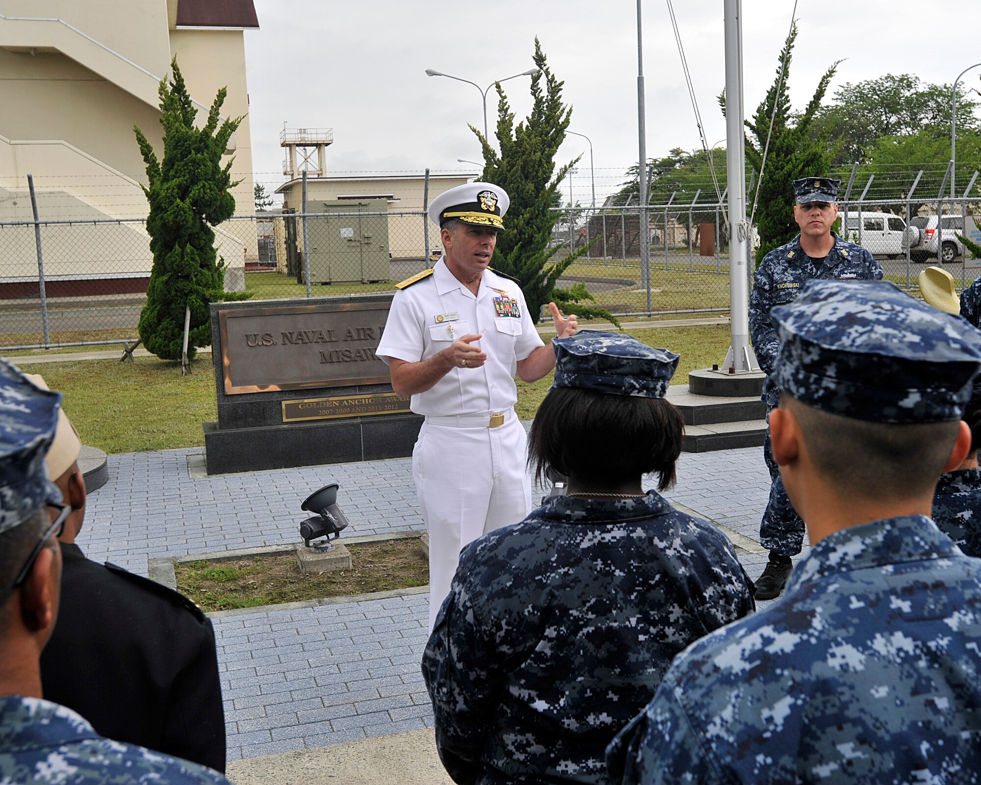 Rear Adm. Terry Kraft, U.S. Naval Forces Japan commander, talks with Sailors attached to Naval Air Facility (NAF) Misawa during an all hands call, June 19, 2014. Kraft is currently NAF Misawa, and is using the opportunity to meet with Sailors, and to inspect the installation’s various facilities. He'll also take part in the NAF Misawa Change of Command Ceremony, June 20. (U.S. Navy photo by Senior Chief Mass Communication Specialist Daniel Sanford/Released)
