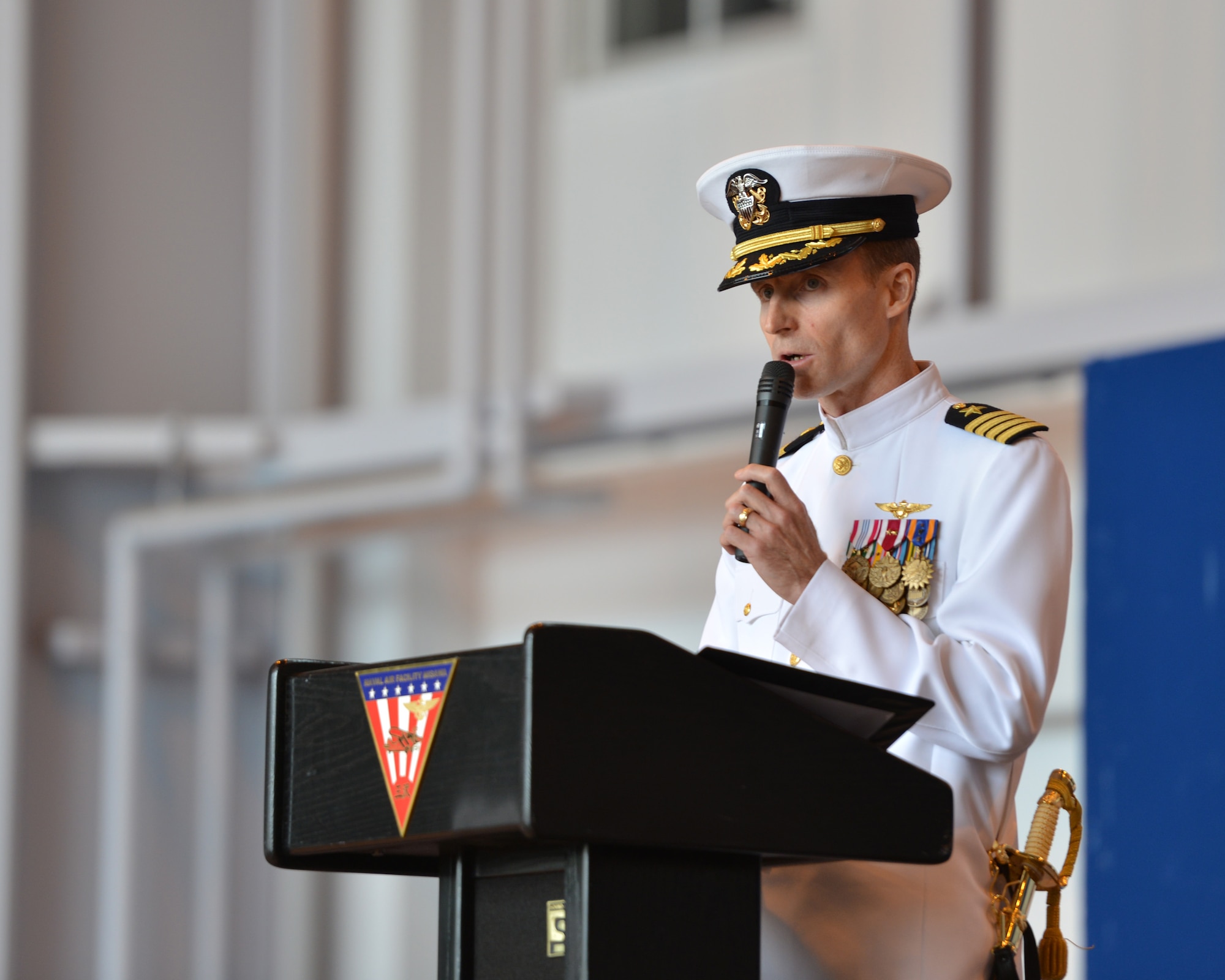 Capt. Keith Henry, originally from Cheshire, Connecticut, addresses the audience after taking command of Naval Air Facility (NAF) Misawa during a change of command ceremony, June 20, 0214.  Henry assumed command of NAF Misawa from Capt. Chris Rodeman, becoming the 18th commanding officer in the installation’s history. NAF Misawa is a U.S. naval base located in northern Japan. (U.S. Navy photo by Mass Communication Specialist 3rd Class Erin Devenberg/Released)