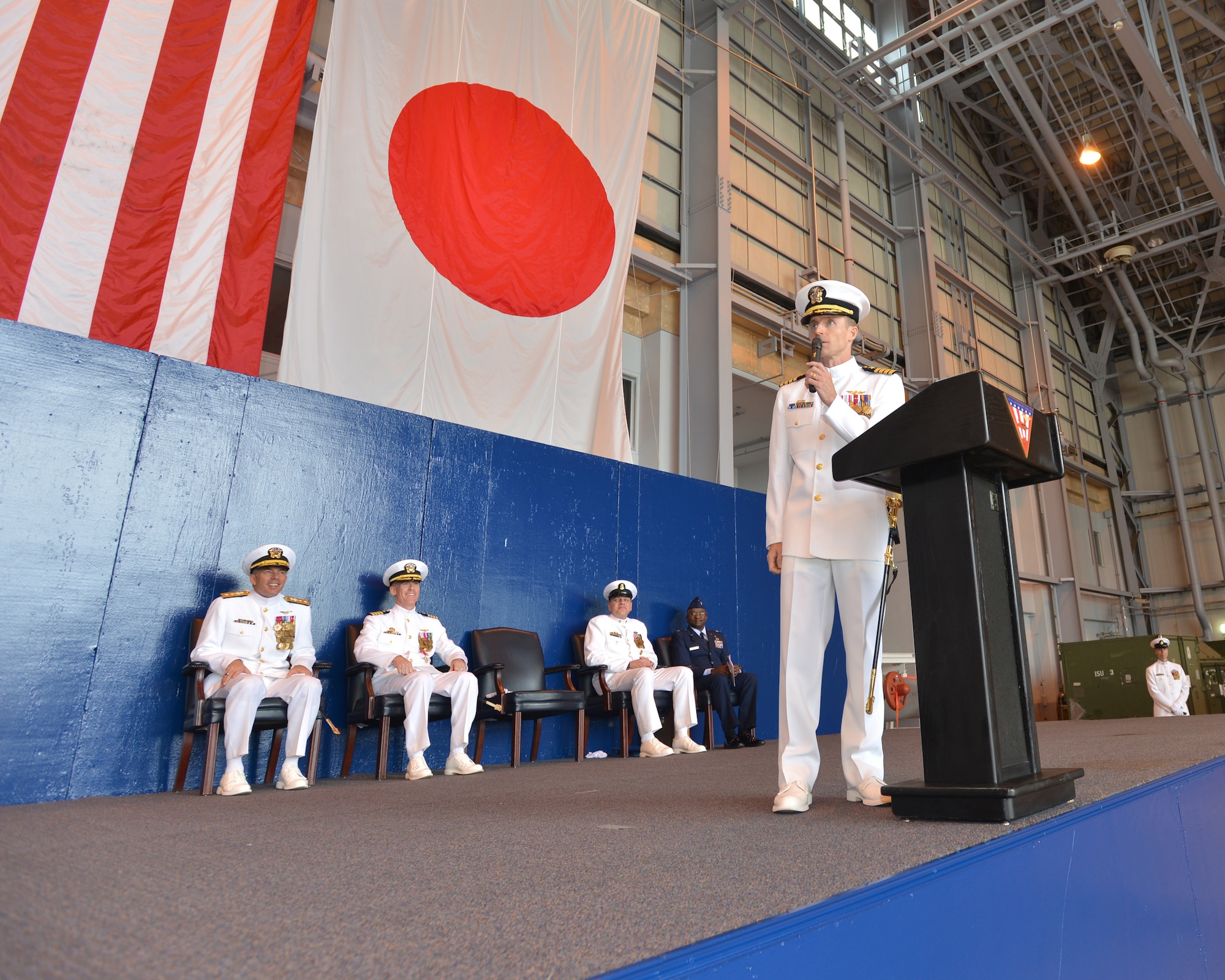 Capt. Keith Henry, originally from Cheshire, Connecticut, addresses the audience after taking command of Naval Air Facility (NAF) Misawa during a change of command ceremony, June 20, 0214.  Henry assumed command of NAF Misawa from Capt. Chris Rodeman, becoming the 18th commanding officer in the installation’s history. NAF Misawa is a U.S. naval base located in northern Japan. (U.S. Navy photo by Mass Communication Specialist 3rd Class Erin Devenberg/Released)