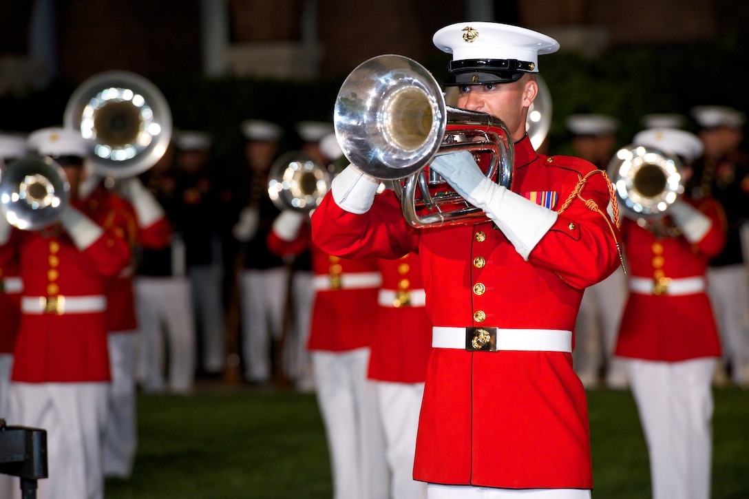 The U.S. Marine Band performs during the Friday evening parade at Marine Barracks Washington, D.C., June 20, 2014.