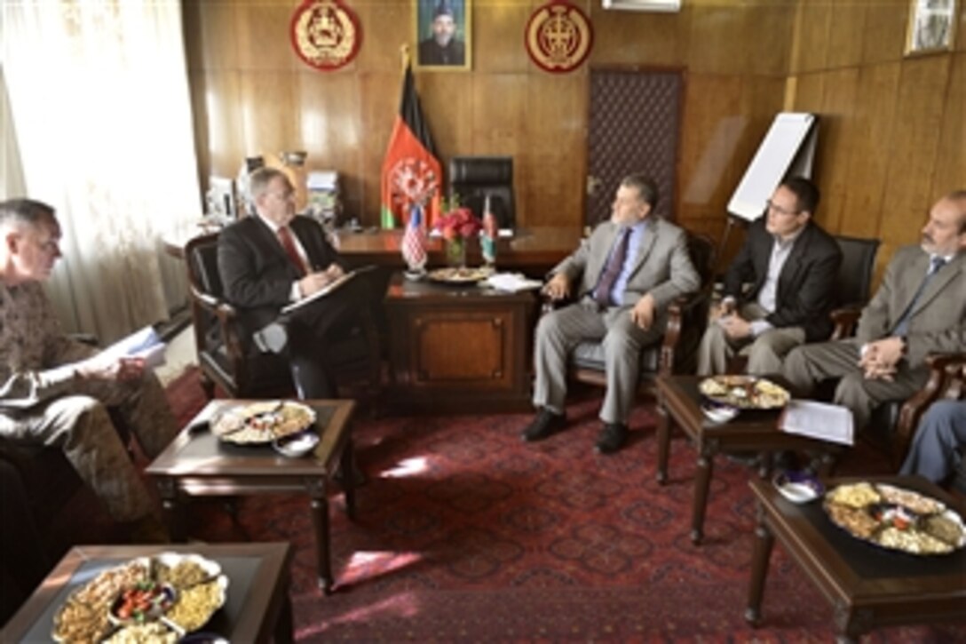 U.S. Deputy Defense Secretary Bob Work, left back, meets with Afghan Defense Minister Besmillah Khan Mohammadi, right back, at the Ministry of Defense in Kabul, Afghanistan, June 23, 2014. U.S. Marine Corps Gen. Joseph F. Dunford Jr., left, commander of the International Security Assistance Force, attended the meeting.