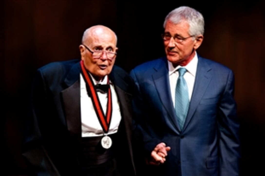 Defense Secretary Chuck Hagel, right, stands with U.S. Rep. John D. Dingell Jr. of Michigan after presenting him with the Lincoln Medal at Ford Theatre’s annual gala in Washington, D.C., June 22, 2014. The annual award is given to individuals, who through their work, accomplishments or personal attributes, exemplify the legacy and character embodied by President Abraham Lincoln. 