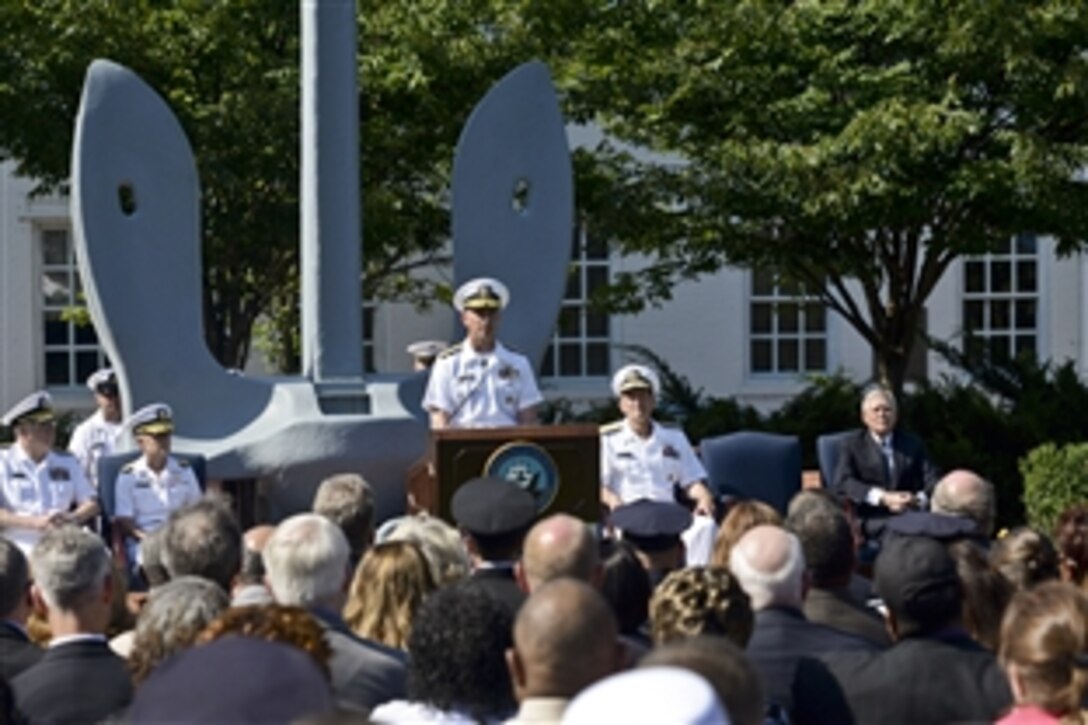 Navy Adm. Jonathan Greenert, chief of naval operations, introduces Navy Secretary Ray Mabus during an award ceremony at the Washington Navy Yard in Washington, D.C., June 23, 2014. Mabus posthumously presented awards to victims, civilian and military first responders, and organizations for actions during the Sept. 16, 2013, shooting at the Navy location.