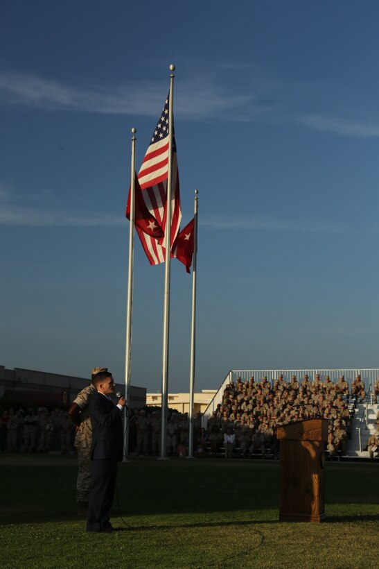 Cpl. William “Kyle” Carpenter, Medal of Honor recipient, speaks during an evening colors ceremony aboard Marine Corps Air Station Miramar Calif., June 23. Carpenter, the most recent Medal of Honor recipient, attended the ceremony as the guest of honor and spoke about the impact noncommissioned officers can make on junior Marines.