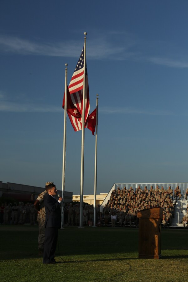 Cpl. William “Kyle” Carpenter, Medal of Honor recipient, speaks during an evening colors ceremony aboard Marine Corps Air Station Miramar Calif., June 23. Carpenter, the most recent Medal of Honor recipient, attended the ceremony as the guest of honor and spoke about the impact noncommissioned officers can make on junior Marines.