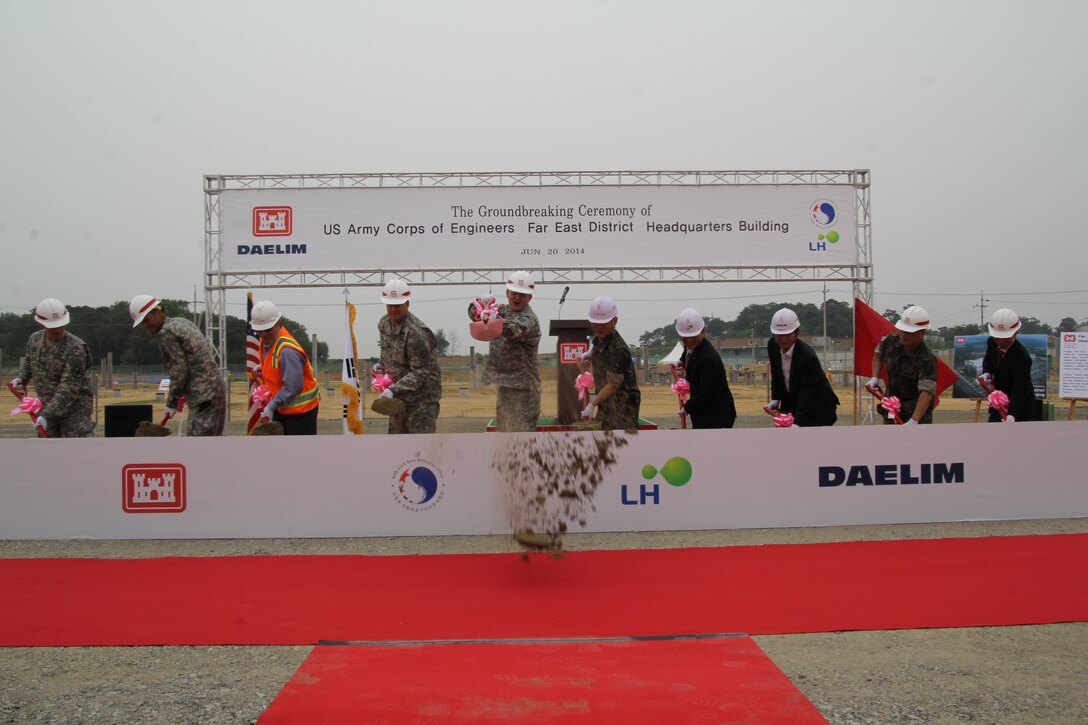 Col. Bryan S. Green (5th from left), commander and engineer of U.S. Army Corps of Engineers Far East District and Republic of Korea Brig. Gen. Kang Chang-koo (5th from right), Director General of Program Management, Ministry of Defense United States Forces Korea Relocation Office are joined by other dignitaries as they break ground on the district's headquarters building.