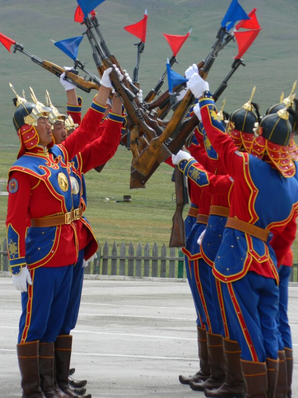 Mongolian Armed Forces perform close-order drill June 20 at the Five Hills Training Area, Mongolia for the opening ceremony of Exercise Khaan Quest 2014. Khaan Quest 14 is a regularly scheduled, multinational exercise co-sponsored this year by U.S. Army Pacific, and hosted annually by Mongolian Armed Forces. Khaan Quest 14 is the latest in a continuing series of exercises designed to promote regional peace and security. This year marks the 12th anniversary of this training event.
