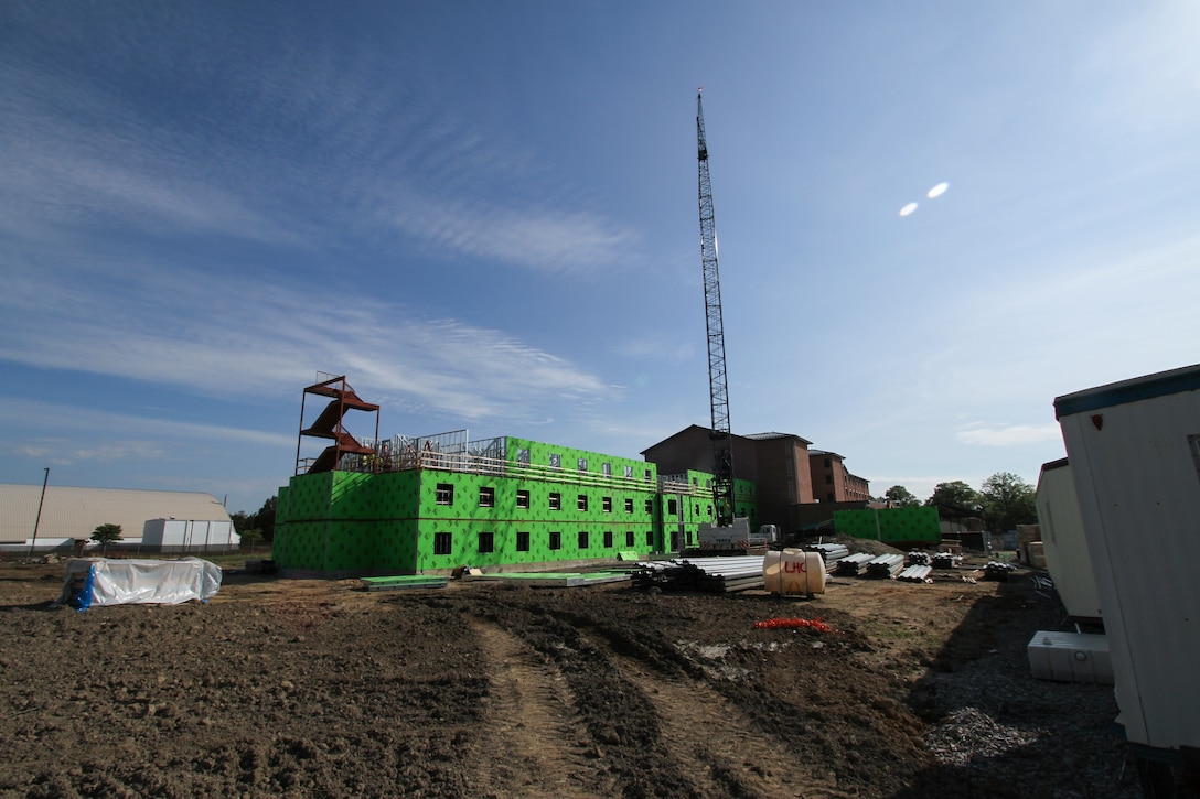 FORT LEE, Va.  -- A five-story 300 person addition is being added on to an existing barracks building as part of the Fort Lee Advanced Individual Training Phase II project, June 6, 2014. The project includes a five-story, 300-person addition to an existing barracks building, as well as a separate five-story, 600-person barracks facility.  (U.S. Army photo/Patrick Bloodgood)