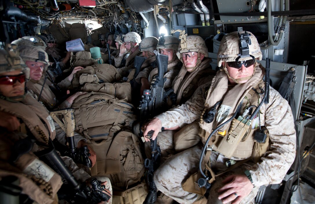 ARABIAN GULF (Jun. 20, 2014) U.S. Marines with the 22nd Marine Expeditionary Unit (MEU) aboard an MV-22 Osprey aircraft with Marine Medium Tiltrotor Squadron (VMM) 263 (Reinforced) wait to depart the USS Mesa Verde (LPD 19) in support of ongoing operations. The 22nd MEU is deployed with the Bataan Amphibious Ready Group as a theater reserve and crisis response force throughout U.S. Central Command and the U.S. 5th Fleet area of responsibility. (U.S. Marine Corps photo by Staff Sgt. Lukas Atwell/Released)